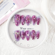 zb33..A variety of almond-shaped and square nails.