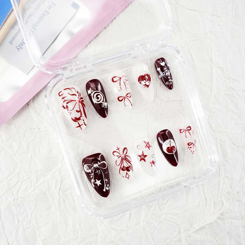 zb33..A variety of almond-shaped and square nails.