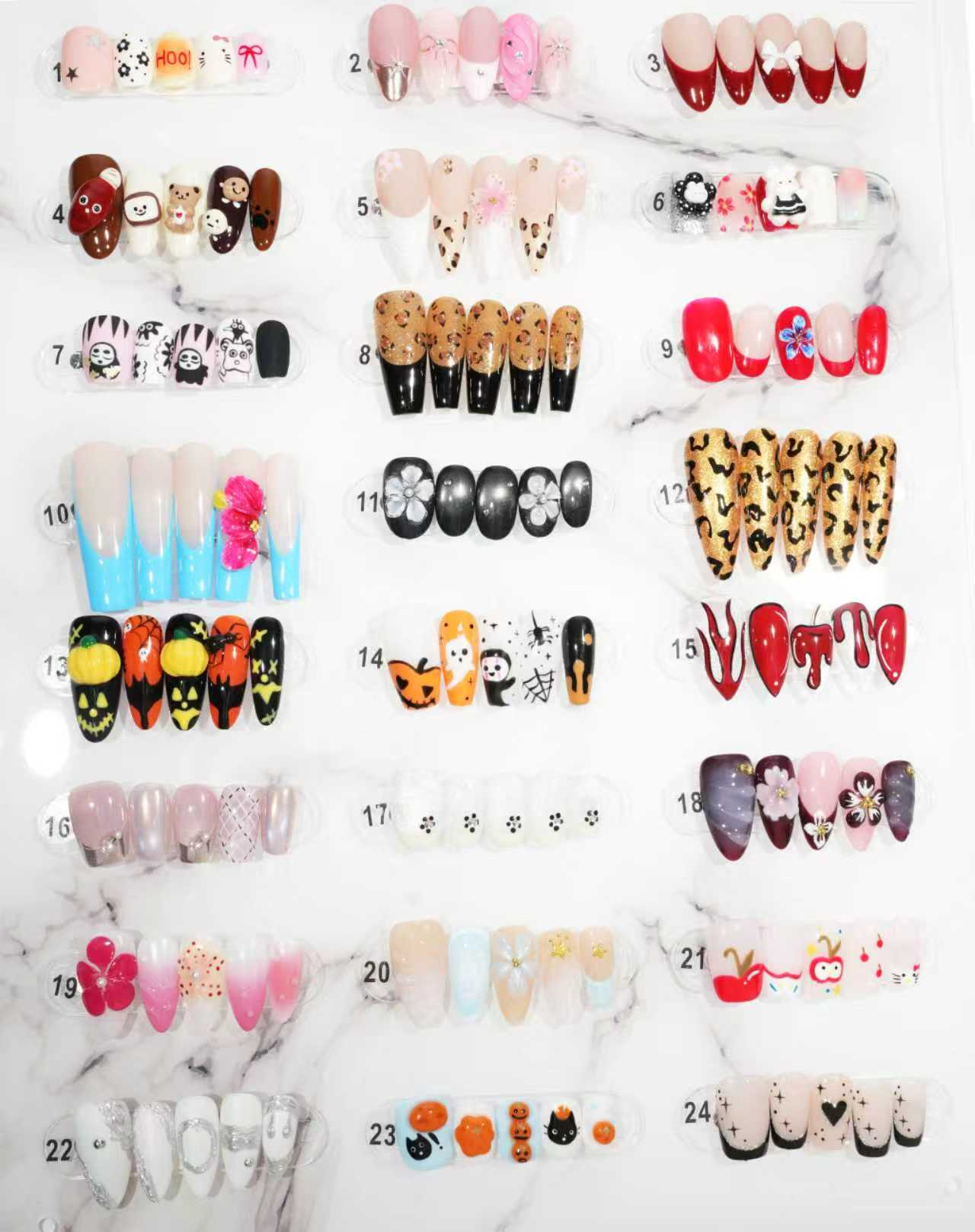 zb34..A collection of almond-shaped and square-shaped wearable nails