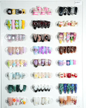 zb98..Nails of various styles.
